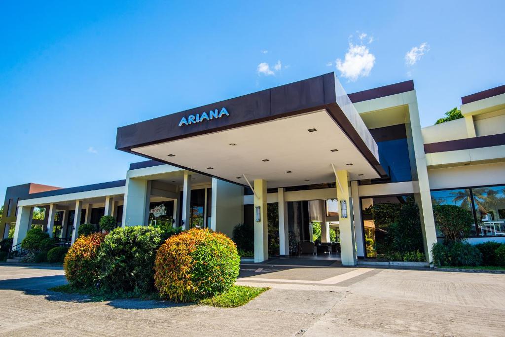 aania sign on the front of a building at Ariana Hotel in Dipolog