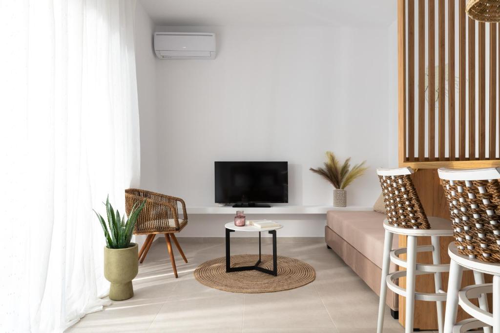 TV a/nebo společenská místnost v ubytování Venthos Apartments