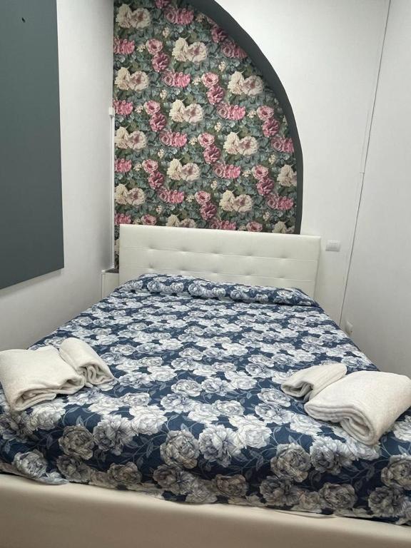 Postel nebo postele na pokoji v ubytování Appartamento int 1