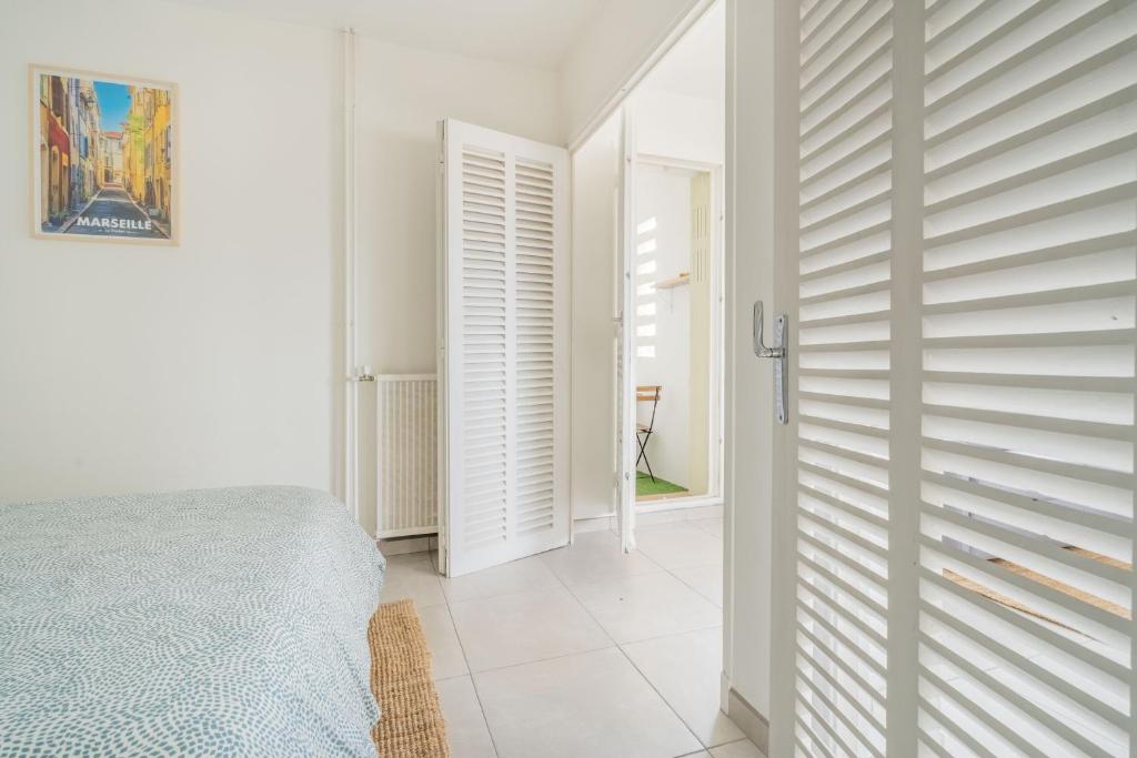 Posteľ alebo postele v izbe v ubytovaní Bel appartement épuré et minimaliste pour 4 pers à Marseille