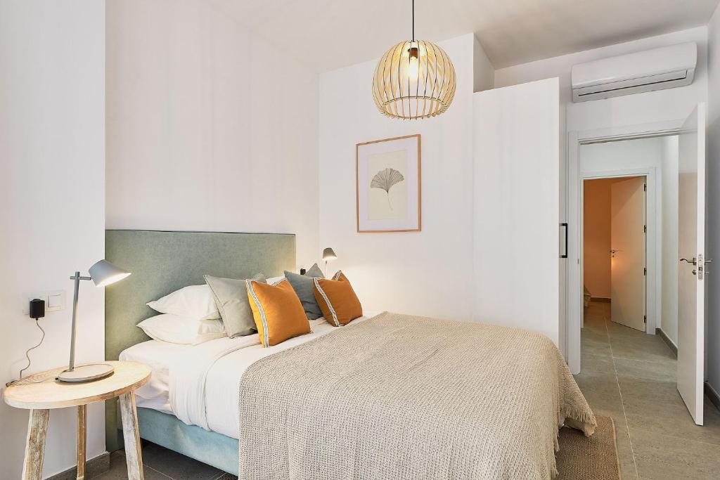 Postel nebo postele na pokoji v ubytování Soho Apartments in Malaga by Solaga Holiday Homes