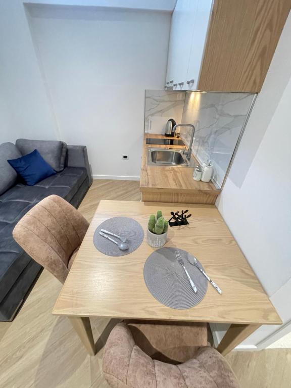 Kuchyň nebo kuchyňský kout v ubytování Arial Trinity Suites