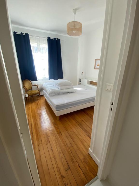 Posteľ alebo postele v izbe v ubytovaní Le Petit Paris