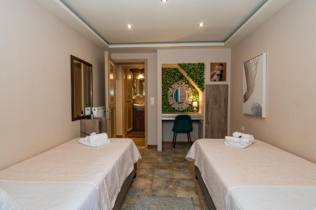 A bed or beds in a room at Star Jasmine House Acharavi