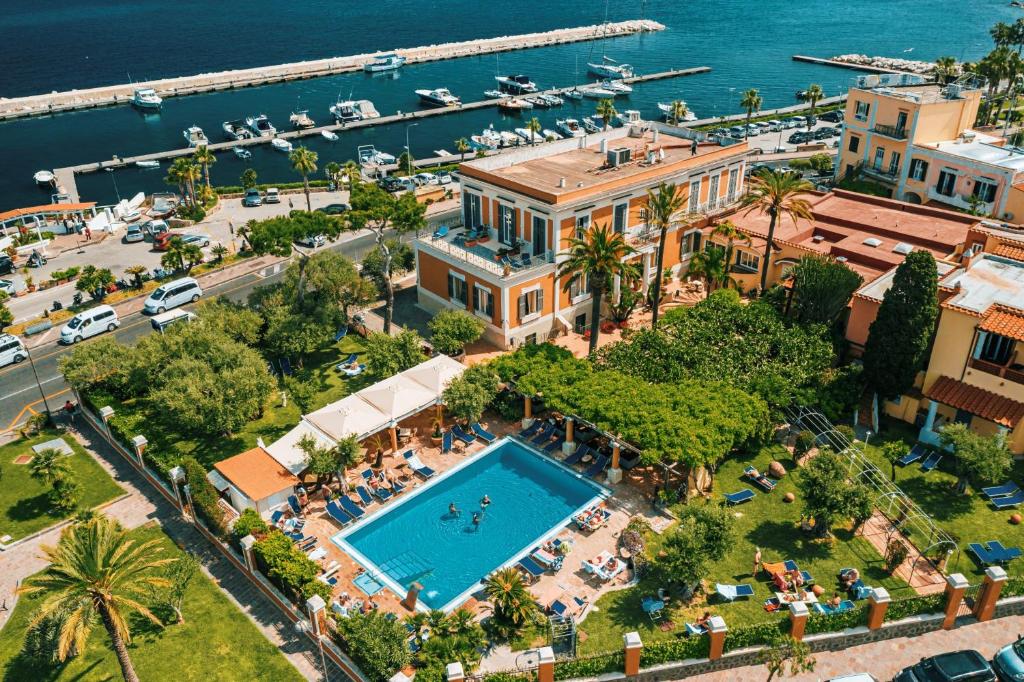 an aerial view of a resort with a swimming pool at Hotel Villa Svizzera Terme in Ischia