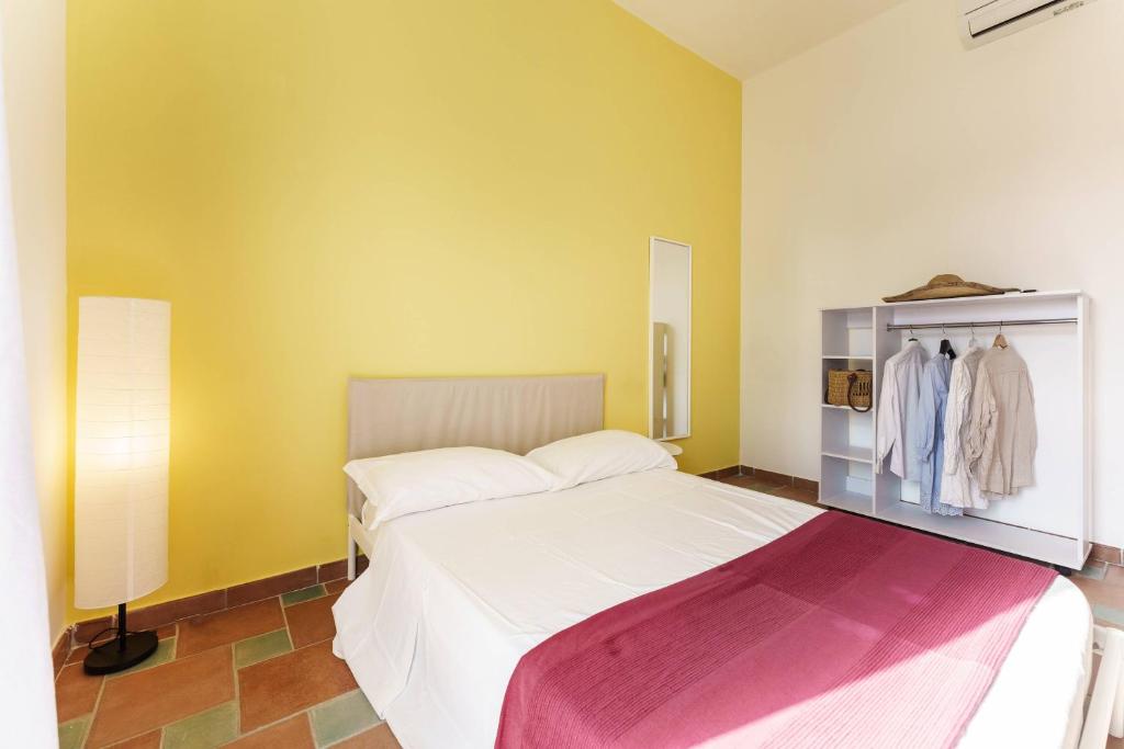 Postel nebo postele na pokoji v ubytování Le Grand Bleu - Gioia Apartments