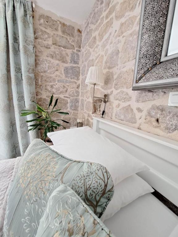 Postel nebo postele na pokoji v ubytování Guest House Kala