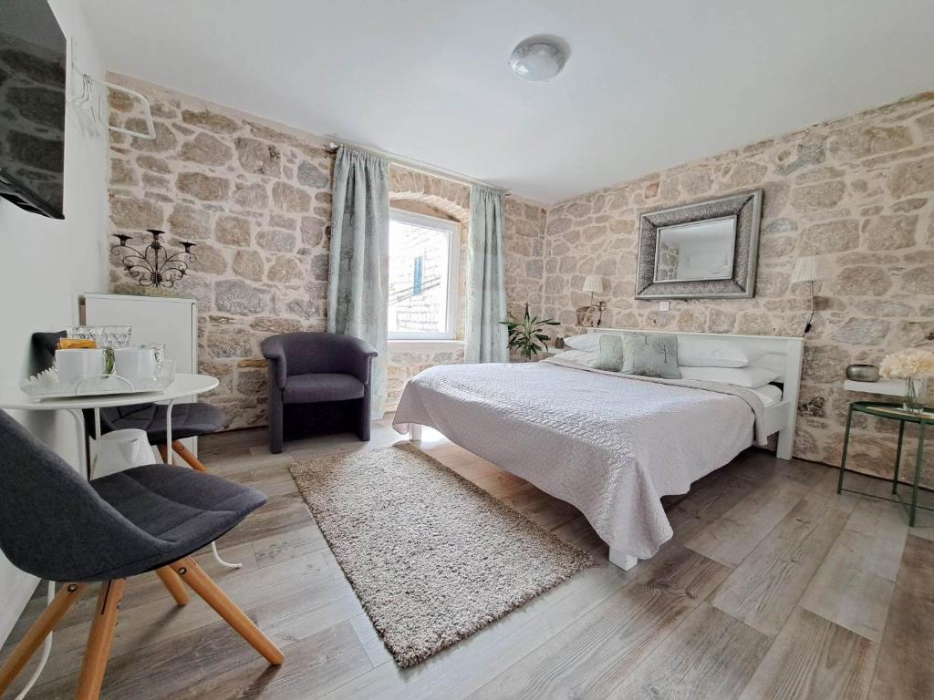 Postel nebo postele na pokoji v ubytování Guest House Kala