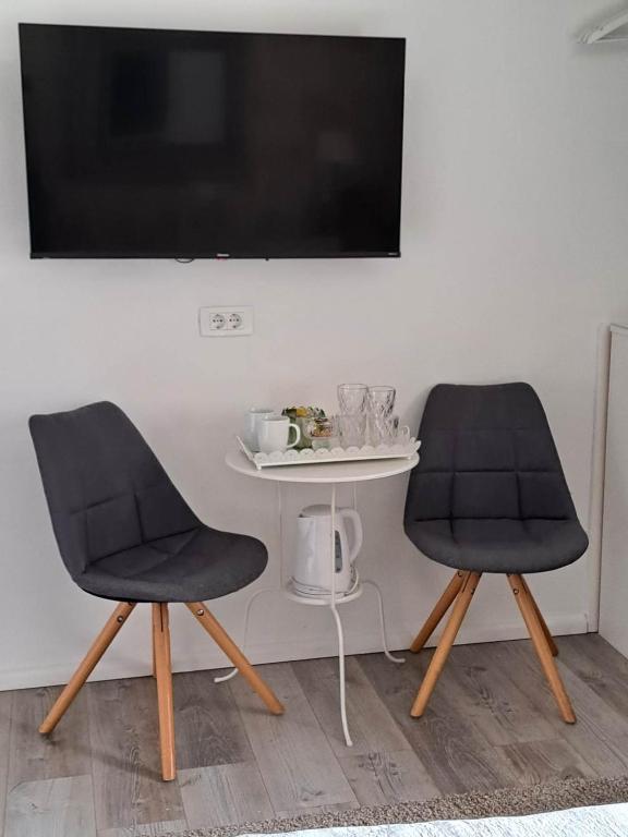 TV a/nebo společenská místnost v ubytování Guest House Kala