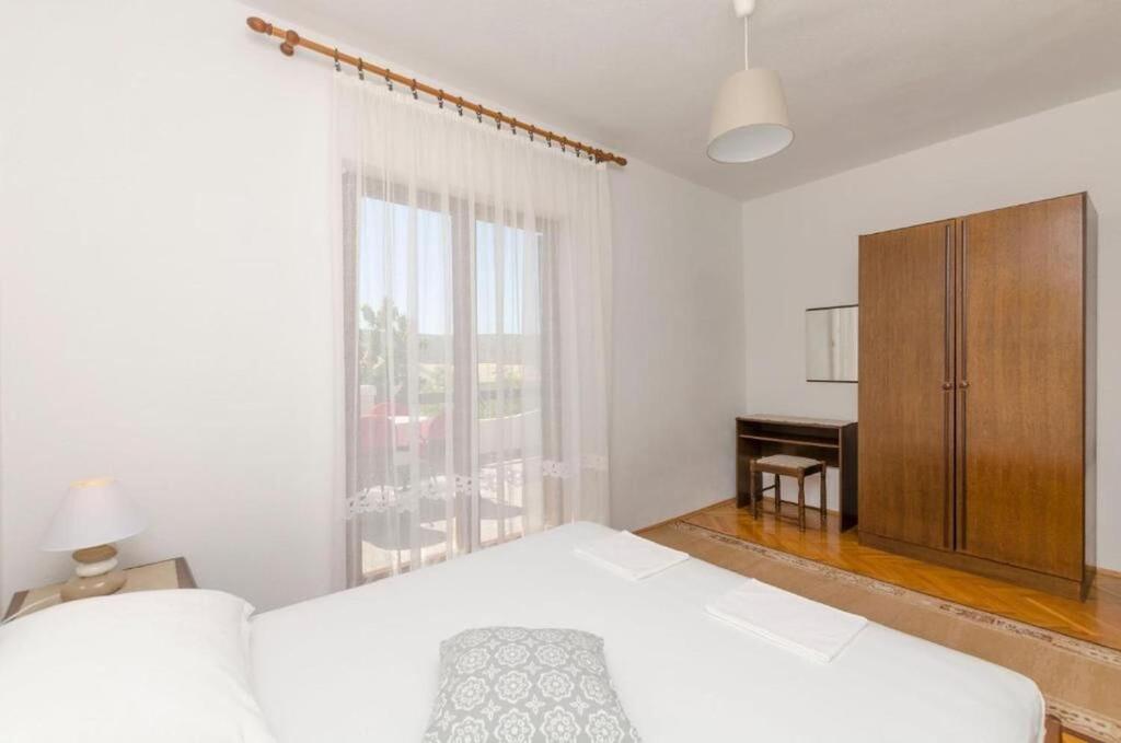 Posteľ alebo postele v izbe v ubytovaní Apartments Spavalo