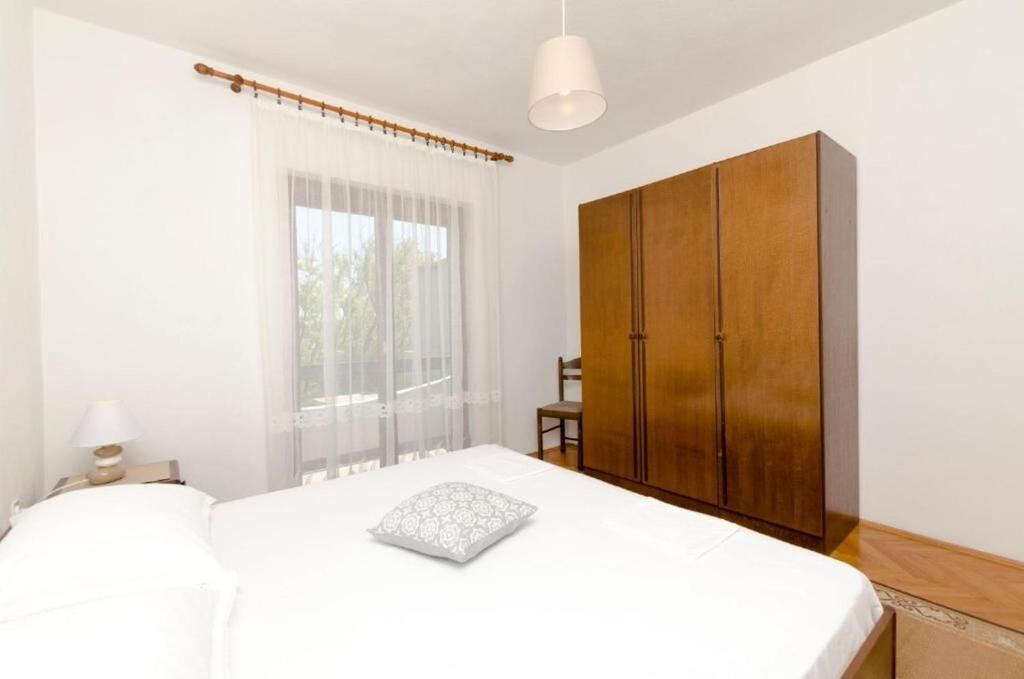 Posteľ alebo postele v izbe v ubytovaní Apartments Spavalo