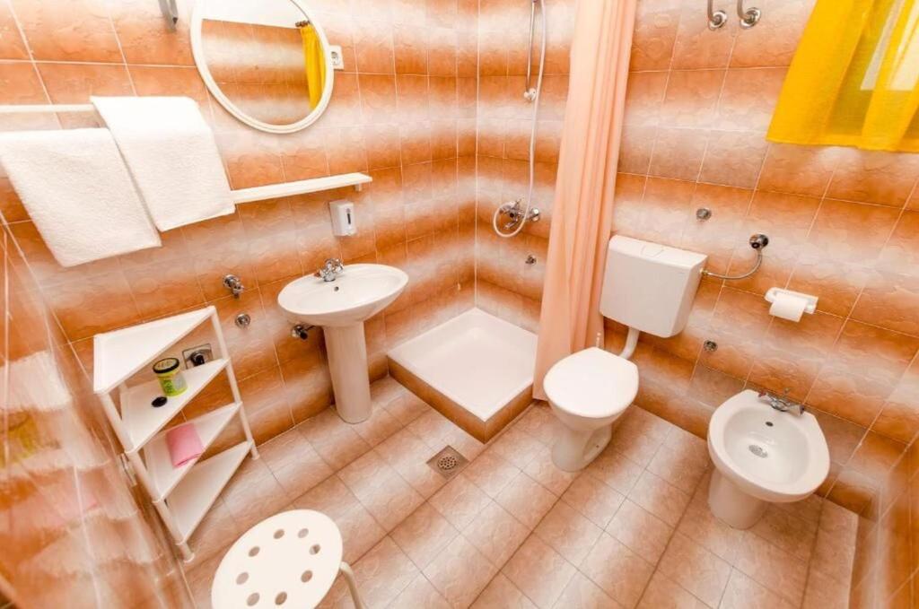 Kúpeľňa v ubytovaní Apartments Spavalo