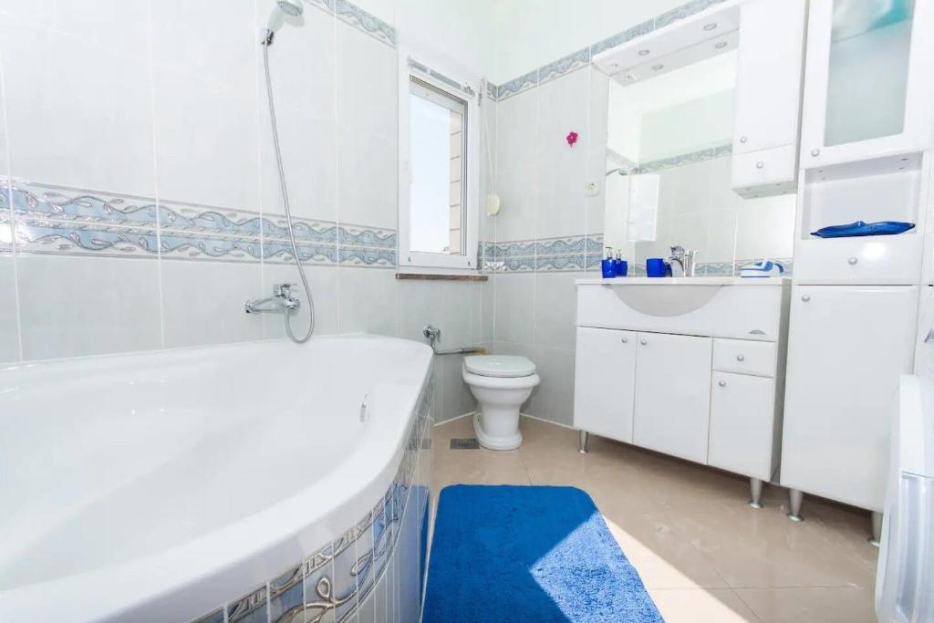 Kúpeľňa v ubytovaní Apartment Helli