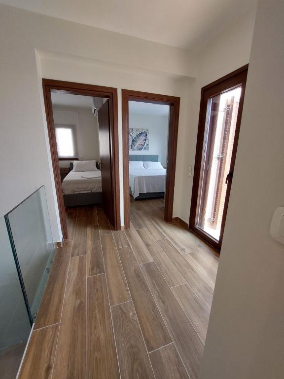 Postel nebo postele na pokoji v ubytování Villa Infinity