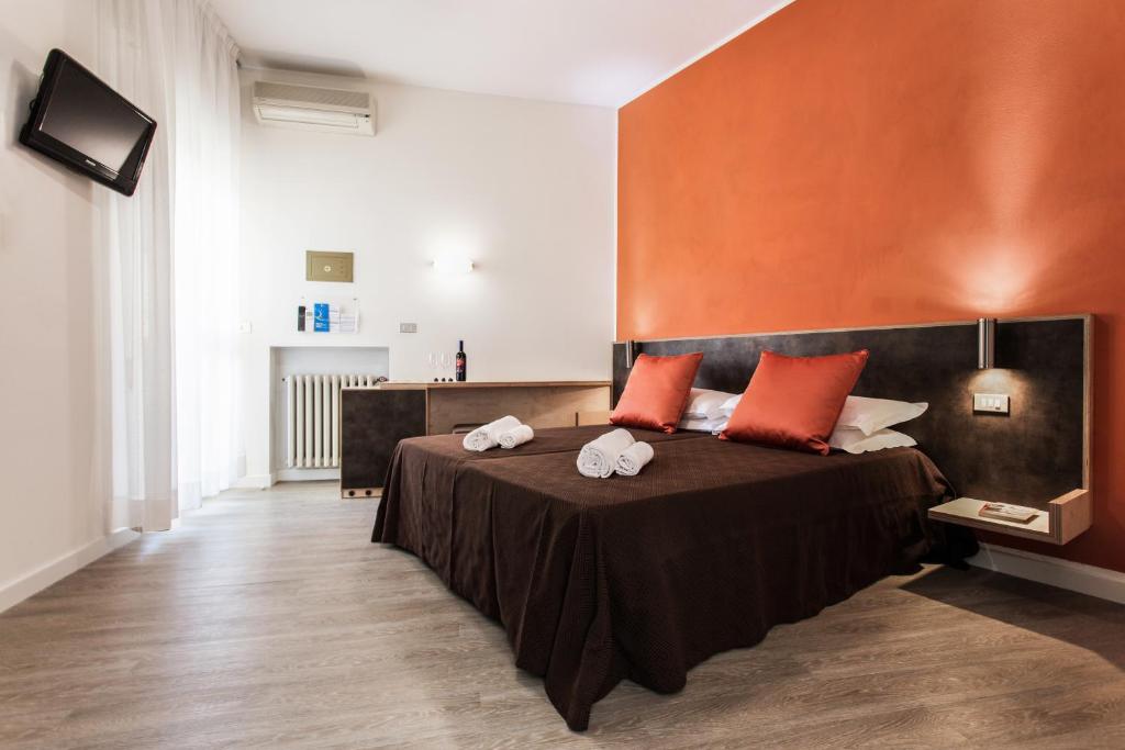Postel nebo postele na pokoji v ubytování Hotel Antares