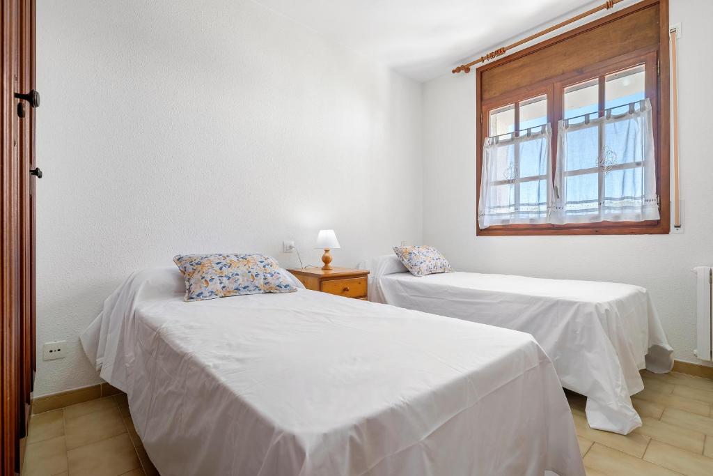 Posteľ alebo postele v izbe v ubytovaní Hauzify I Casa Mirador 9