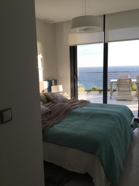 Postel nebo postele na pokoji v ubytování Soria Beach