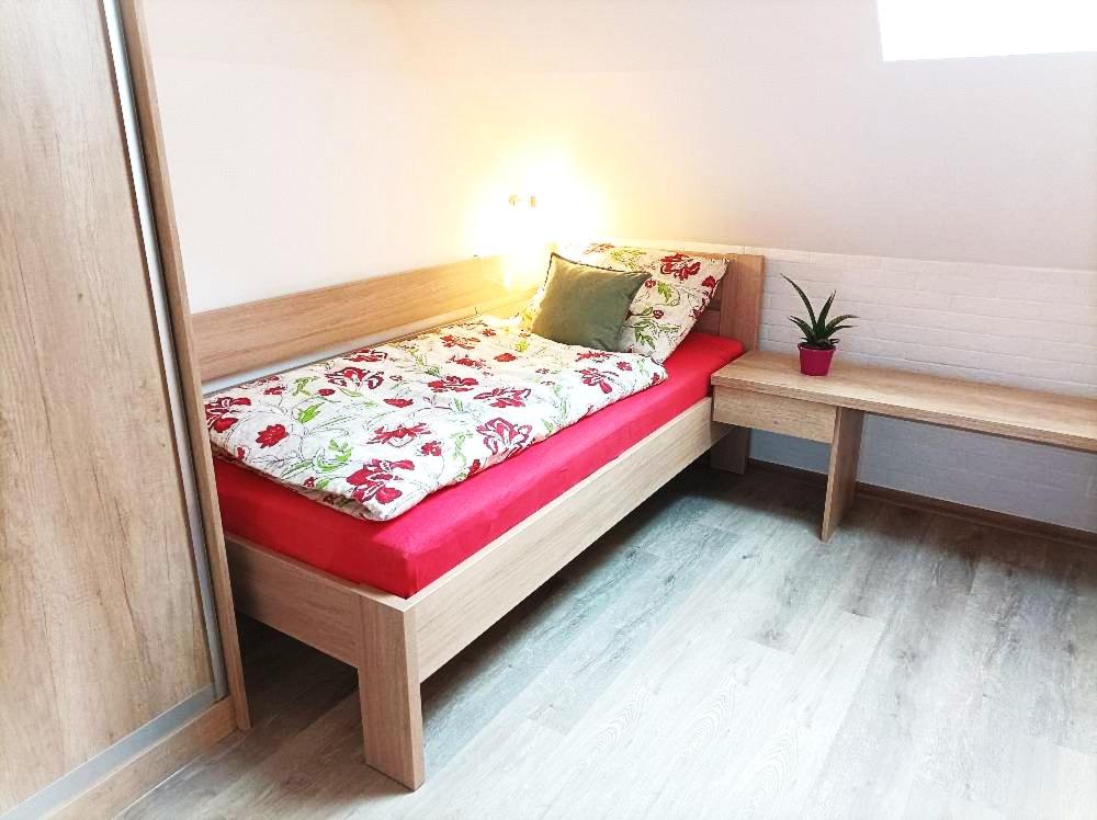 Postel nebo postele na pokoji v ubytování Apartmán UšeBu