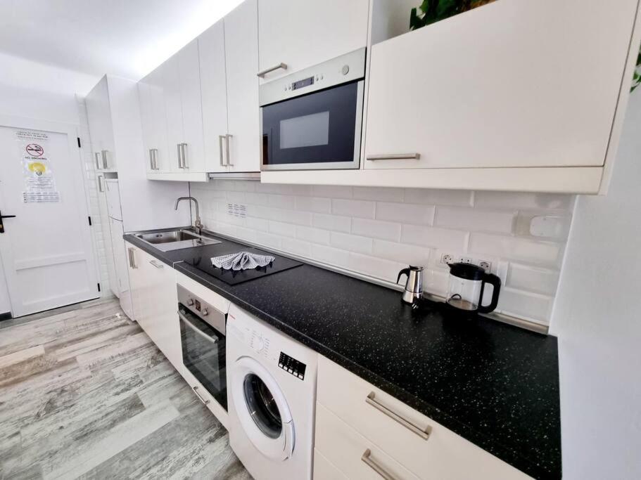 Kuchyň nebo kuchyňský kout v ubytování Apartamento SMERALDO 11 PLAYA ROCA