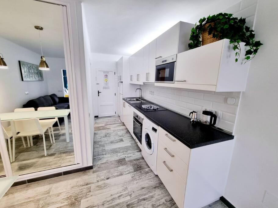 Kuchyň nebo kuchyňský kout v ubytování Apartamento SMERALDO 11 PLAYA ROCA