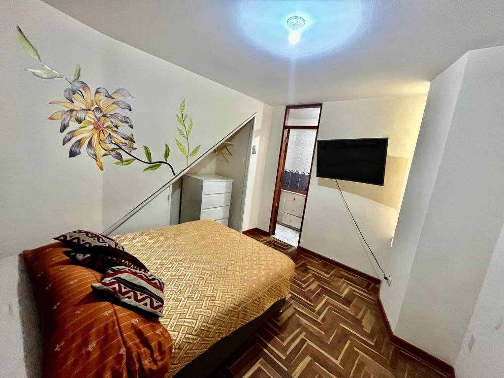 Voodi või voodid majutusasutuse Cusco House Inn Hostel toas