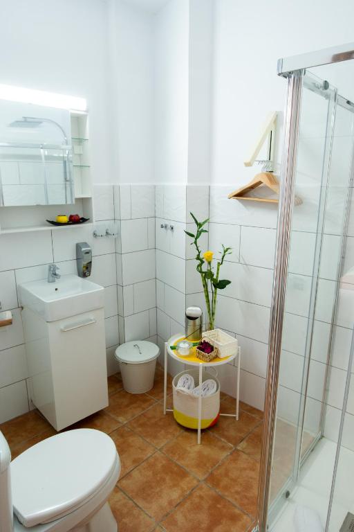 Koupelna v ubytování Geko Hotels