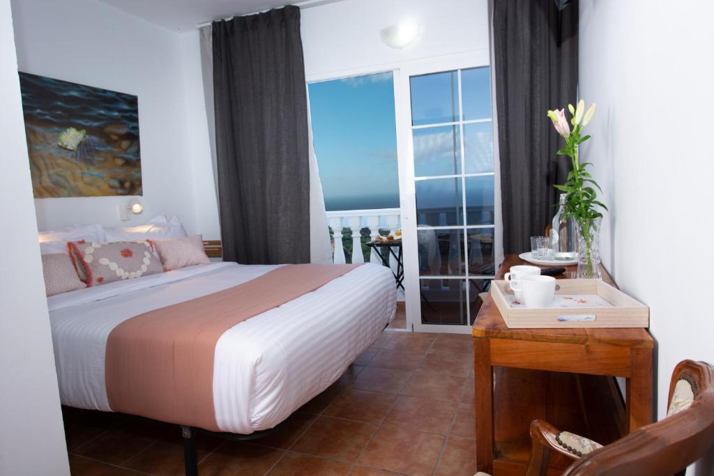 Postel nebo postele na pokoji v ubytování Geko Hotels