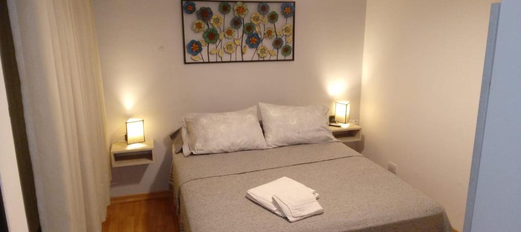 En eller flere senge i et værelse på Ensueño