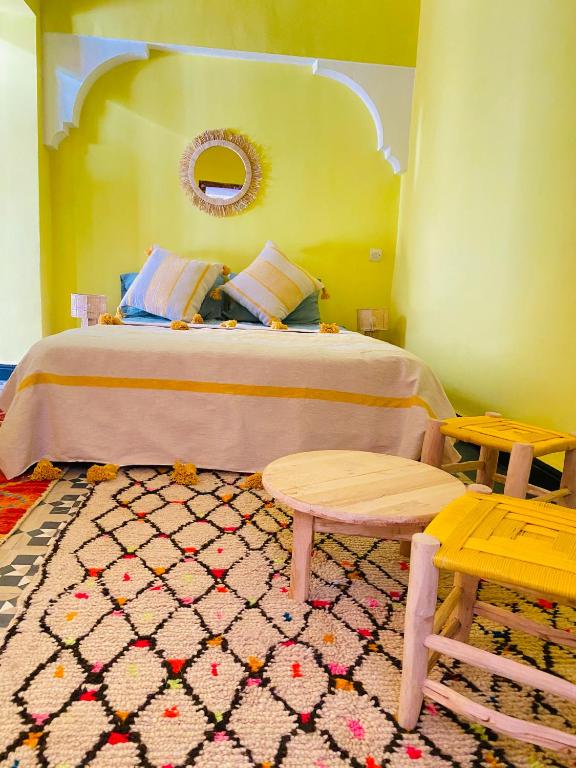Postel nebo postele na pokoji v ubytování RIAD GALIYA