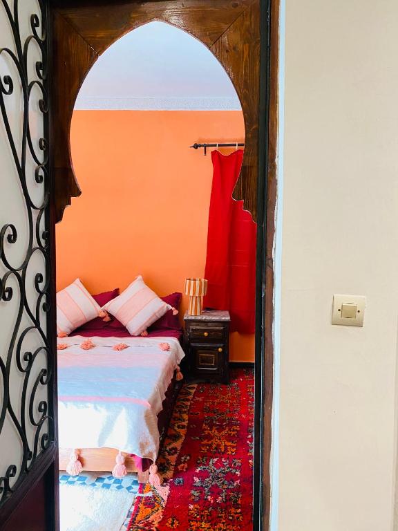 Postel nebo postele na pokoji v ubytování RIAD GALIYA