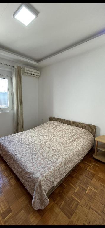 Postel nebo postele na pokoji v ubytování Apartmani centar ulcinj