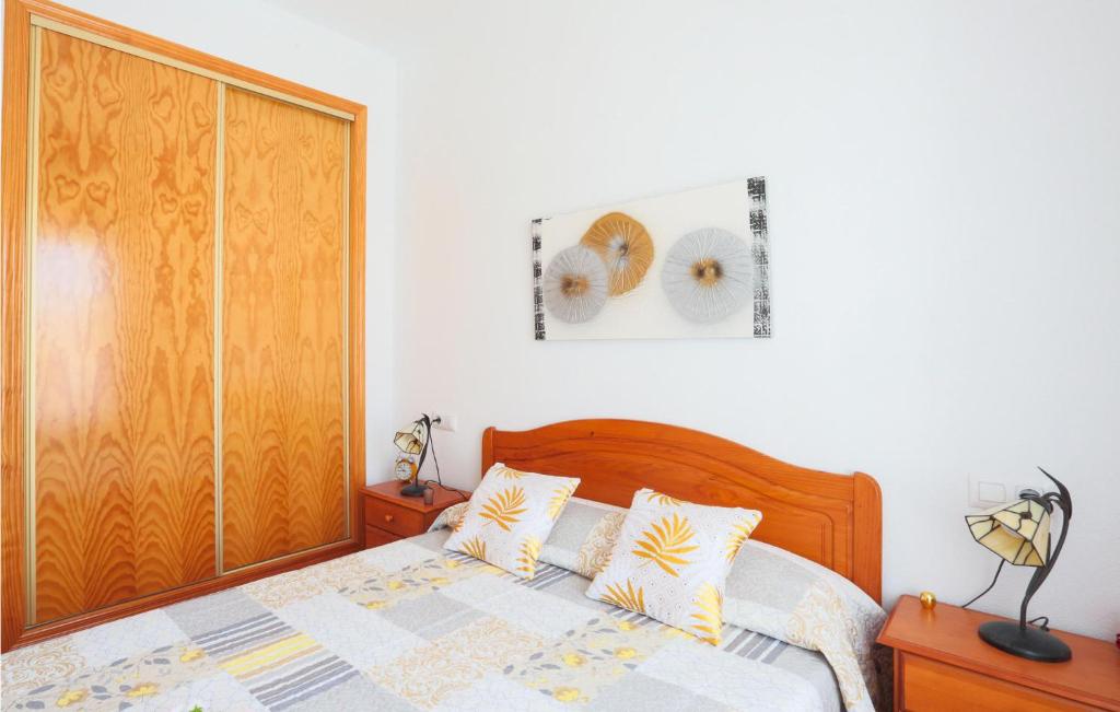 A bed or beds in a room at Bluemoon 2
