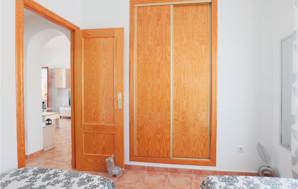 A bed or beds in a room at Bluemoon 2