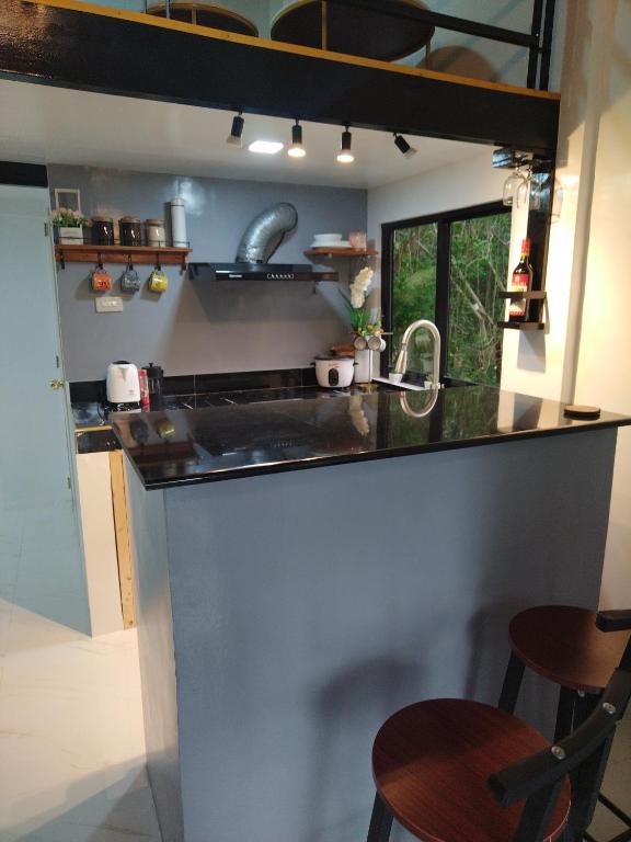 Kuchyň nebo kuchyňský kout v ubytování Tiny House Loft Style