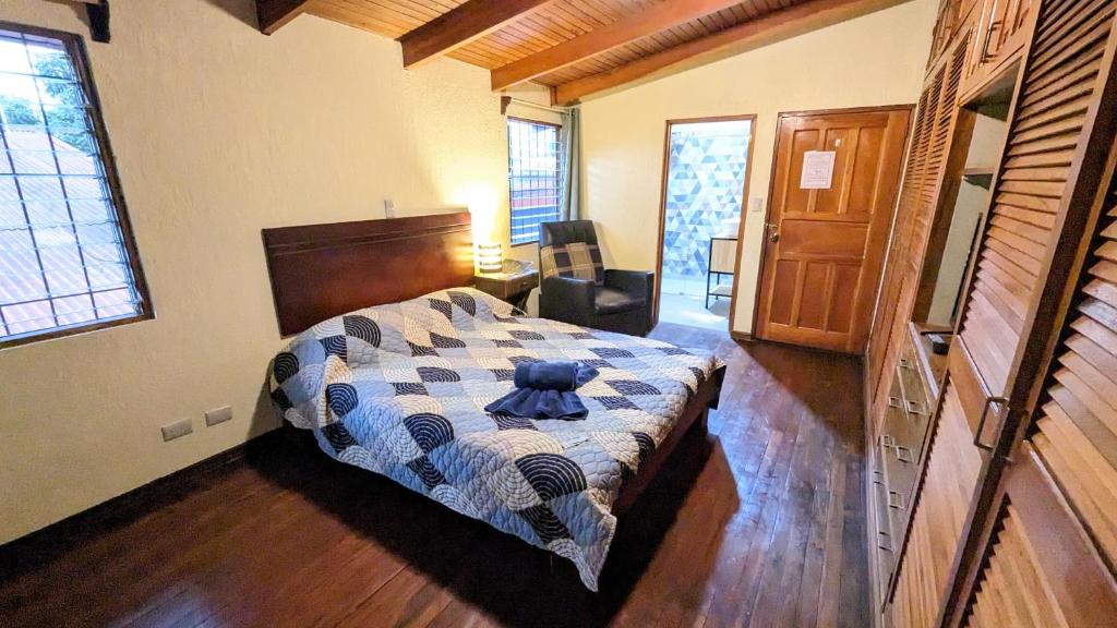 Postel nebo postele na pokoji v ubytování Mangifera Hostel
