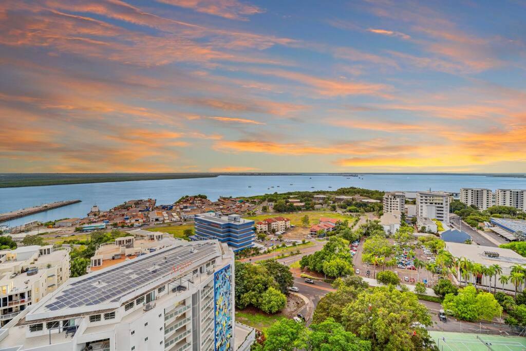 an aerial view of a city with the ocean at Spectacular Darwin apartment in Darwin