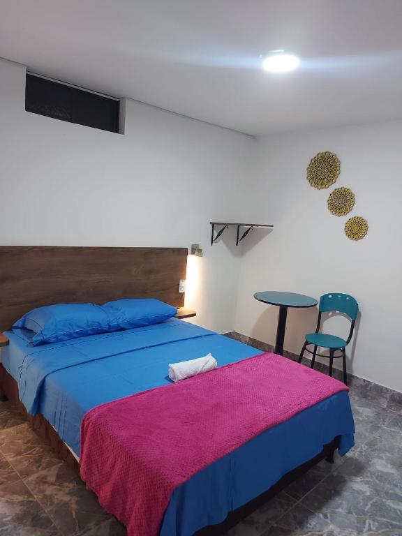 Postel nebo postele na pokoji v ubytování HOTEL DEPARTAMENTAL