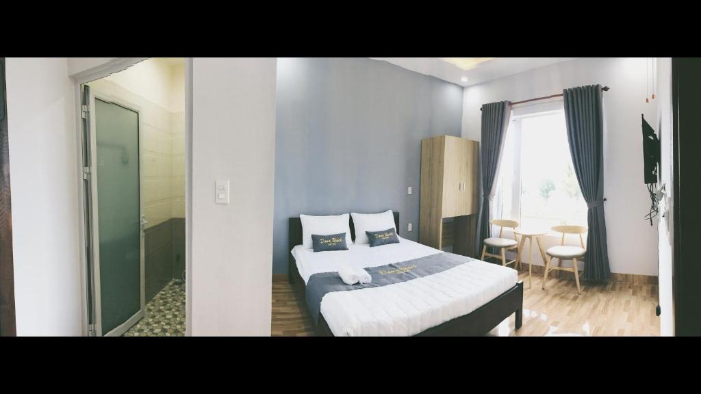 Postel nebo postele na pokoji v ubytování DANA BEACH Motel