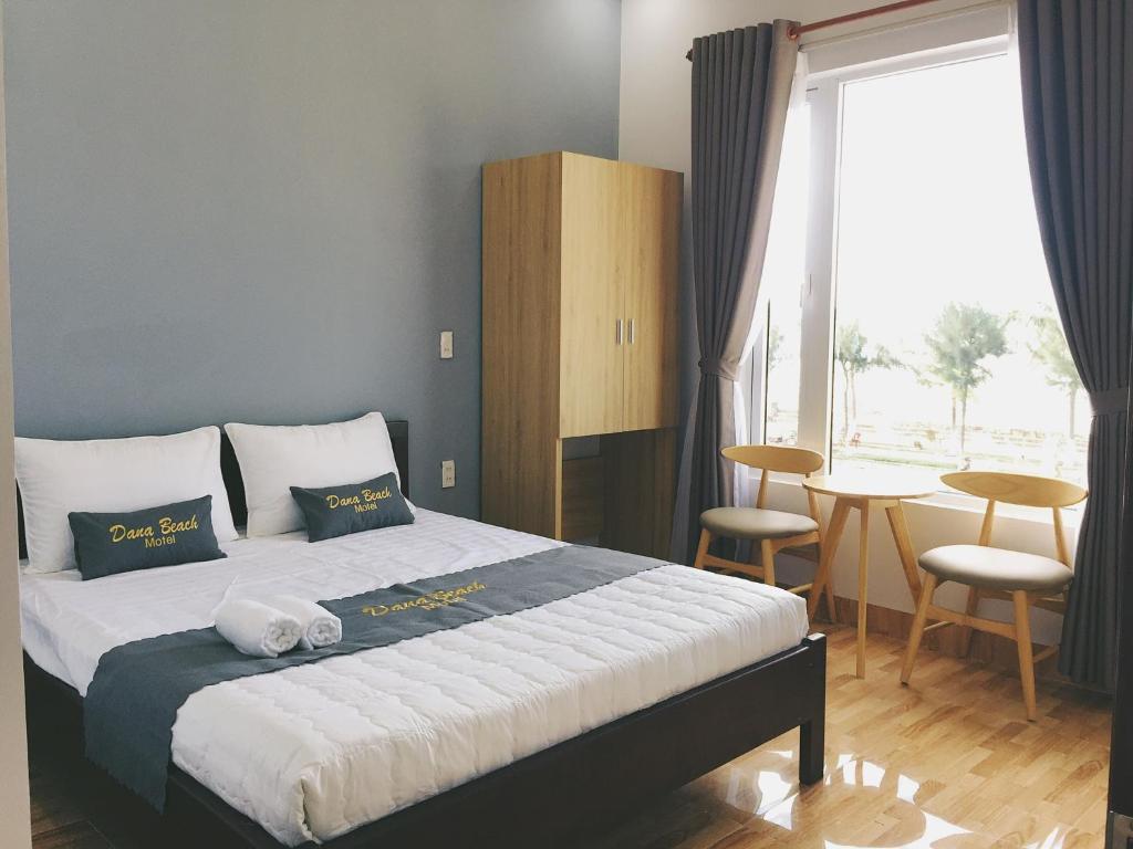 Postel nebo postele na pokoji v ubytování DANA BEACH Motel