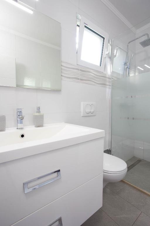 Koupelna v ubytování Apartments Edi - ZF Hvar