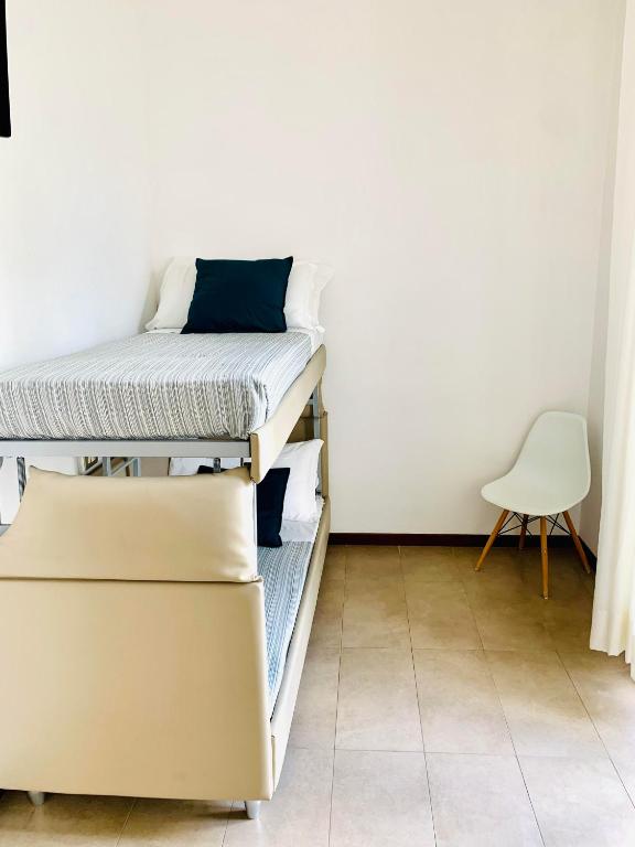 Postel nebo postele na pokoji v ubytování Hotel Mon Pays