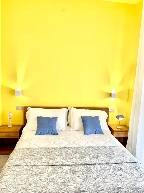 Postel nebo postele na pokoji v ubytování Hotel Mon Pays
