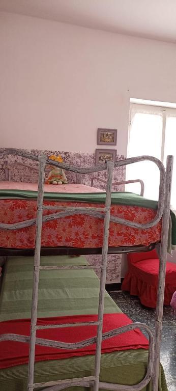 Łóżko lub łóżka w pokoju w obiekcie Cascina Marasca Appartamento Viola