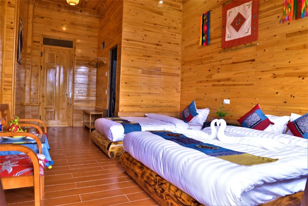 Postel nebo postele na pokoji v ubytování Hmong Eco Villas