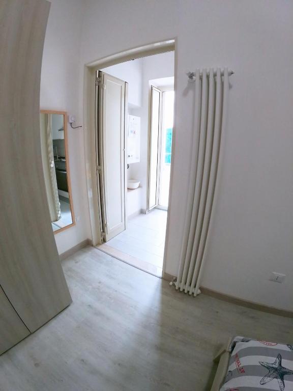 A bed or beds in a room at La casetta di Gaeta