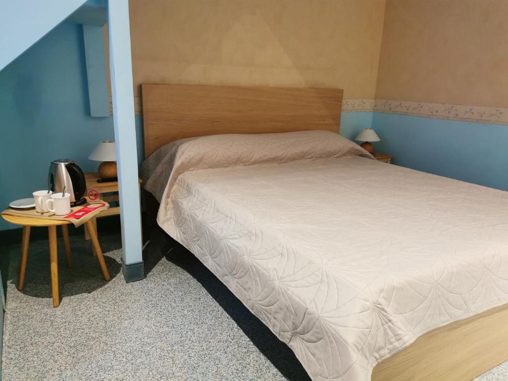 Łóżko lub łóżka w pokoju w obiekcie Venice Dose Suite