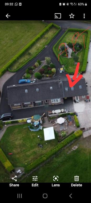 a screenshot of a picture of a building and a street at peaceful one bedroom apartment in Antrim