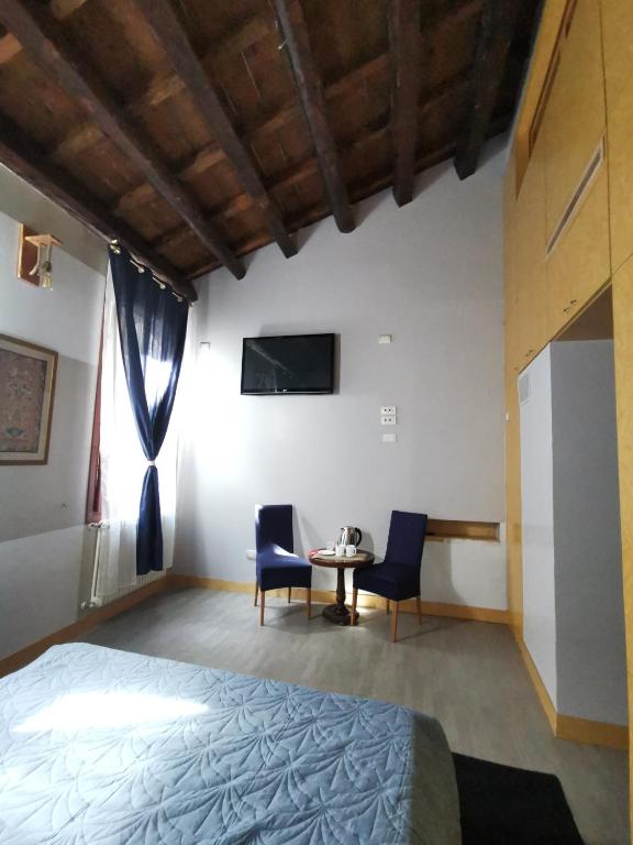 Łóżko lub łóżka w pokoju w obiekcie Venice Dose Suite
