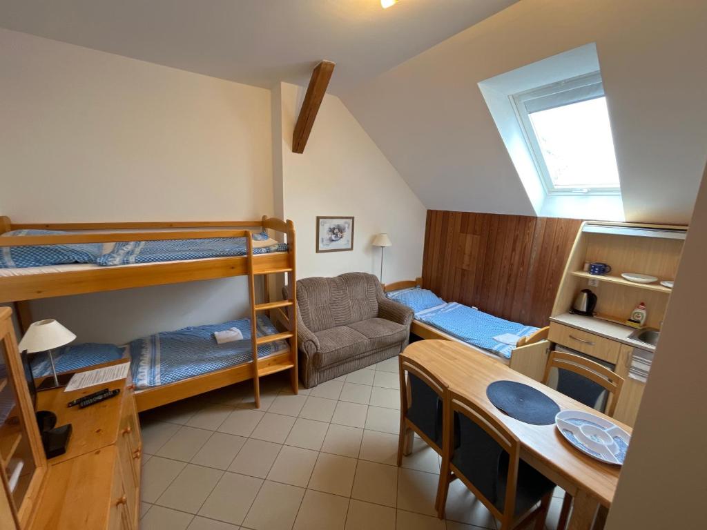 Postel nebo postele na pokoji v ubytování Sokolí hnízdo
