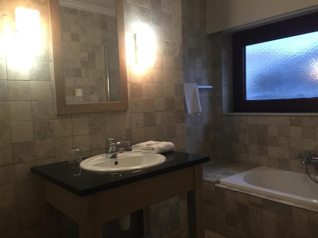 Koupelna v ubytování Hotel Atlas